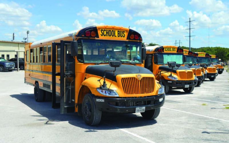 Lampasas ISD school buses sit parked at the district’s transportation barns. New school buses and special needs buses did not make the cut in this year’s 2024-2025 fiscal year budget as the district navigates tighter than usual finances. ERICK MITCHELL | DISPATCH RECORD
