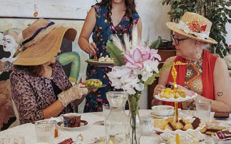 “Tea Fit For a Queen” participants receive snacks and refreshments during Saturday’s event hosted by Lampasas Community Gardens. GABRIELA SANGACHE | DISPATCH RECORD