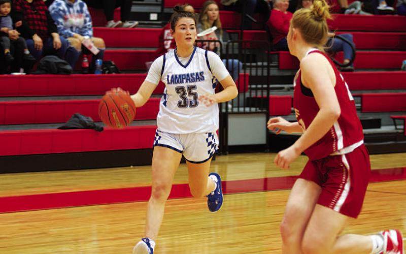 Brooke White drives past a Salado defender during the Monday playoff game. HUNTER KING | DISPATCH RECORD