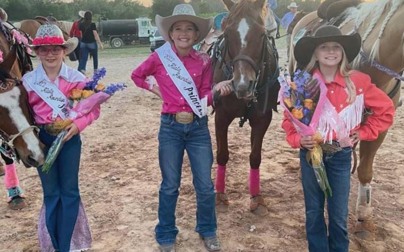 Younger members of the Riata Roundup Rodeo court are, from left, Sweetheart Hadyn Ferguson, Princess Harper Evans and Hadlee McCorkle, who won the Cowgirl Tuff category. ALEXANDRIA RANDOLPH | DISPATCH RECORD