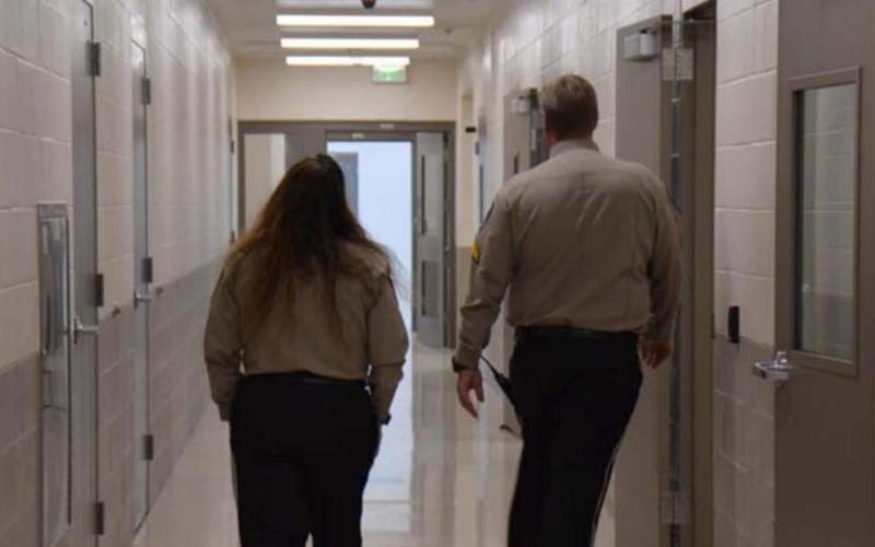 There is a staffing shortage among law enforcement agencies nationwide. Lampasas County is not an exception. Two Lampasas County Sheriff’s Office staff members are shown walking the hallways of the county’s new law enforcement center in March 2021. FILE PHOTO
