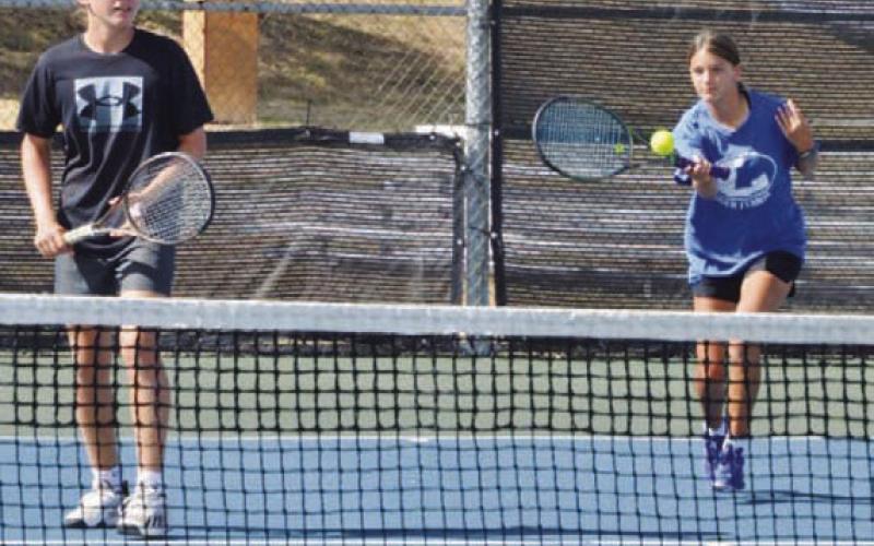 COURTESY PHOTO | KENNETH PEISER Jack Allison, left, and Madelynn White won their first mixed doubles match last week.
