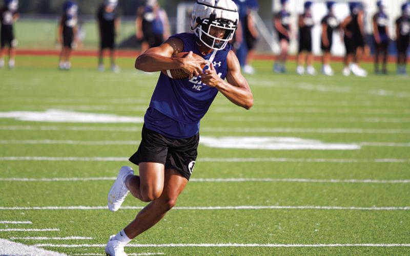 Ty Johnson and Badger football started after-school practice Thursday. HUNTER KING | DISPATCH RECORD