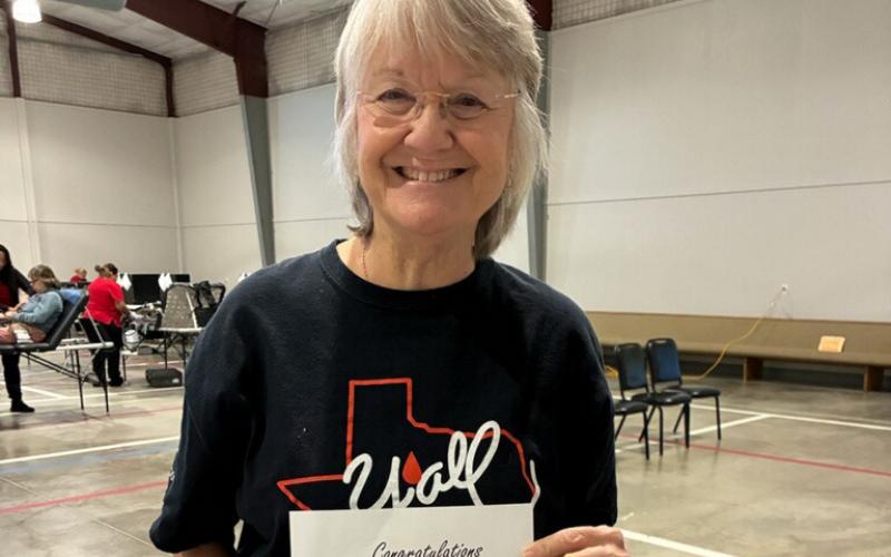 Glenda Rasco participated in the Lampasas community blood drive, held Nov. 11 at First Street Church of Christ’s Family Life Center. She displays the certificate she earned, signifying she has reached the 4-gallon mark for her blood donations. couartesy photo