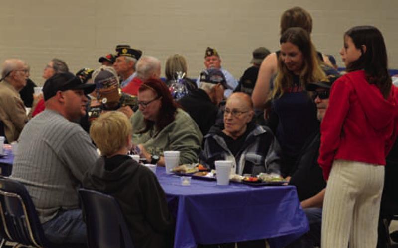 LMS staff and students help serve veterans during Monday’s breakfast. ERICK MITCHELL | DISPATCH RECORD