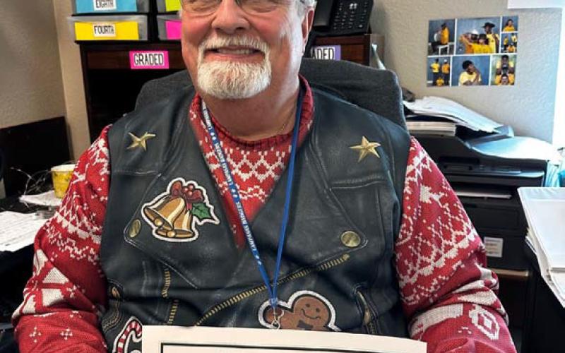 Mark Price, who frequently fills in at the high school campus, was honored as the November Substitute of the Month. COURTESY PHOTO
