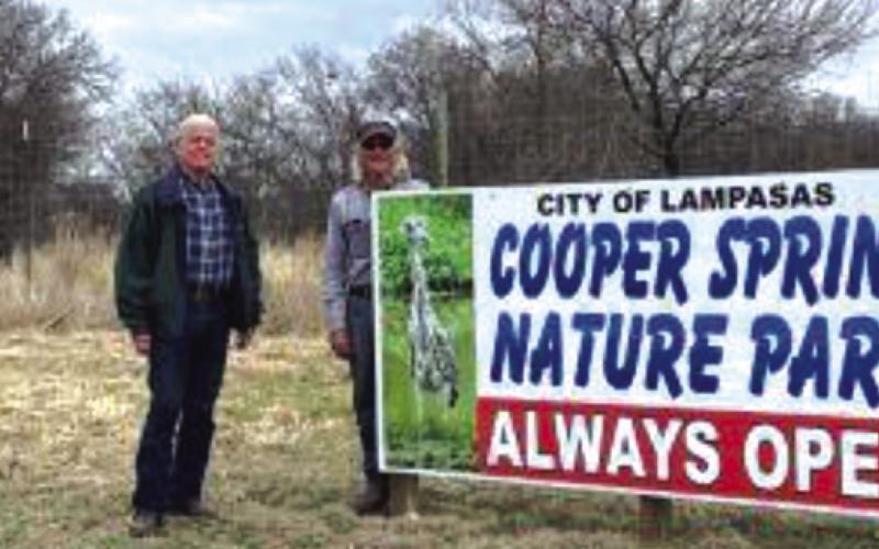 Paul Holland, at left, Hill Country SWCD technician, stands with Cooper Spring Nature Park board member Harrell Clary. The Soil &amp;amp; Water Conservation District recently provided a pollinator wildflower seed mix for the park, and Clary worked to prepare soil beds for the mix. COURTESY PHOTO