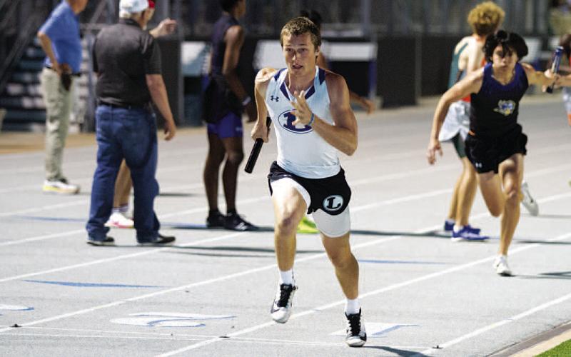 HUNTER KING | DISPATCH RECORD Sean Smith has been running the third leg in the 4x400-meter relay for the Badgers.