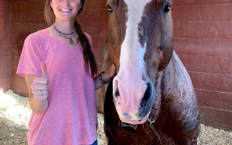 Meagan Cline is shown with a stud horse on the Four Sixes Ranch in West Texas, a ranch known for the quality of its quarterhorses. Cline attends Texas A&amp;amp;M University and comes from a long line of professionals in the equine industry. COURTESY PHOTO