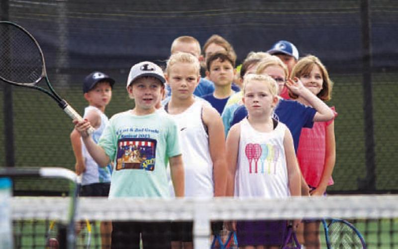 HUNTER KING | DISPATCH RECORD Campers wait in line for the next drill to start.