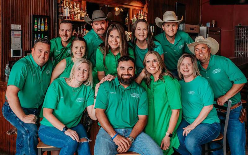 After year-long preparations by committee volunteers, the 2024 Spring Ho Festival is ready to begin on Monday. The Spring Ho Committee responsible for all the planning is comprised of, front row from left, Annie Trotter, Spinner Dimas, Mandy Johnson and Tricia Sneed; middle row, Jason Bobo, Blake Parrish, Stacy Oncke, Megan Tabor and Bryan Ellis; top row, Chuck Stermer, Bart Clary and Bobby Bumpas. COURTESY PHOTO | LAUREN CRAWFORD PHOTOGRAPHY