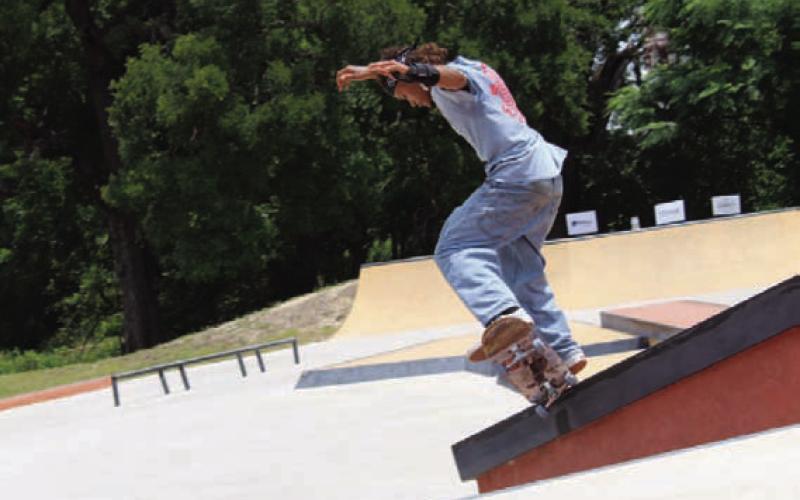 Mario Ramero IV rides down the railing of the staircase on his board during the Born to Soar Skate Competition hosted by the Wings of Eagles Outreach. CHLOE COWDREY | DISPATCH RECORD