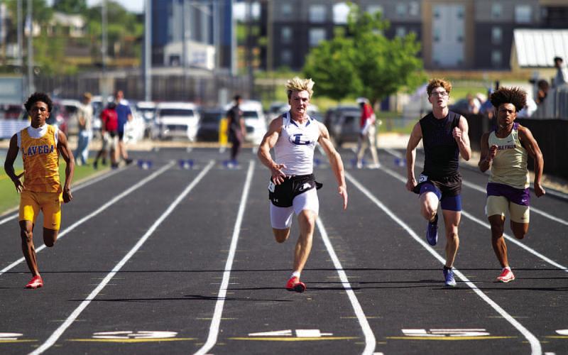 HUNTER KING | DISPATCH RECORD Aaron Everts sprints to the finish line during the 100-meter dash at the area track meet in Jarrell on Wednesday.