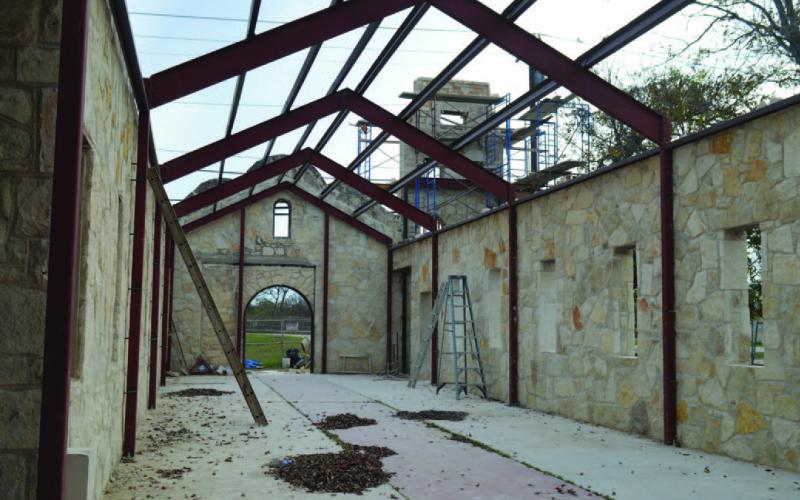 Steel frames have been added to boost the structural integrity of the walls at the former St. Paul’s AME Church. A windstorm in 2019 caused the roof to collapse and the west wall of the structure crumbled, but restoration efforts are aimed at restoring the church building with its “Alamo” resemblance. ERICK MITCHELL | DISPATCH RECORD