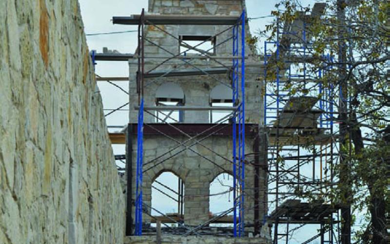 Renovations continue along the Fourth Street church’s bell tower. Steel beams have been added as reinforcement. ERICK MITCHELL | DISPATCH RECORD