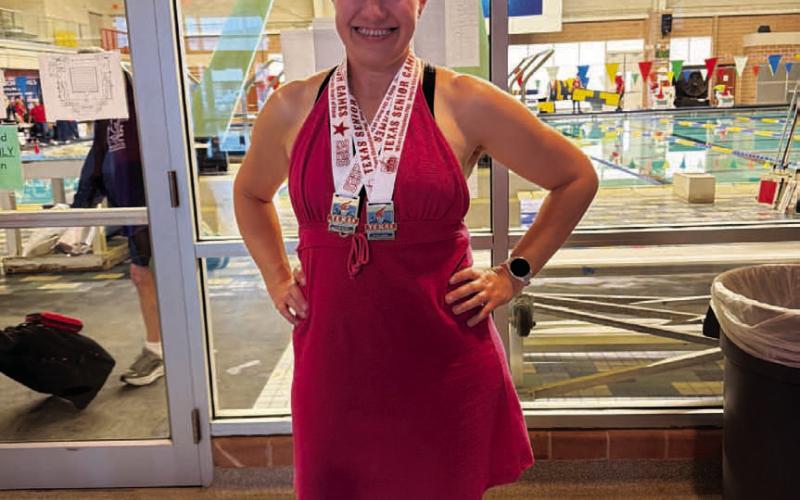 Keitha Goodwin poses with her medals from two first-place finishes at the Texas Senior Games. COURTESY PHOTO