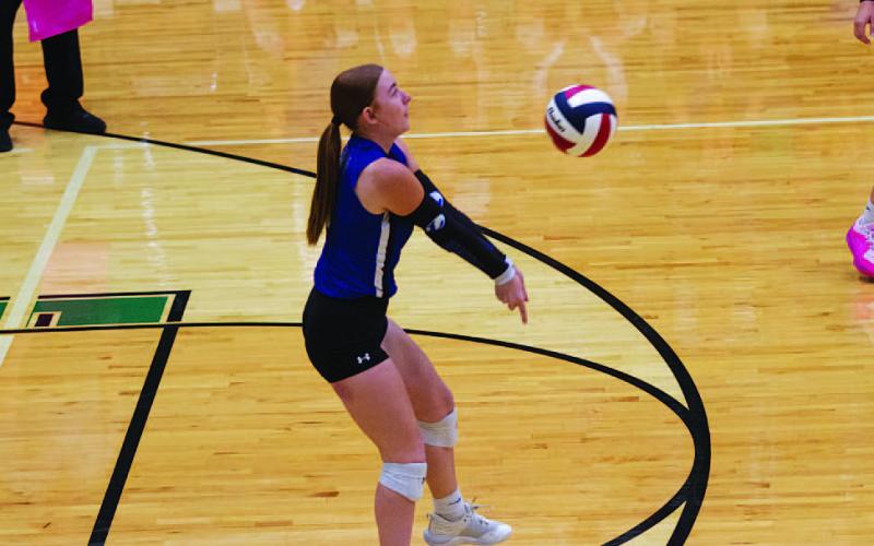 Caitlyn Bengsch passes a ball for the Lady Badgers last season. FILE PHOTO