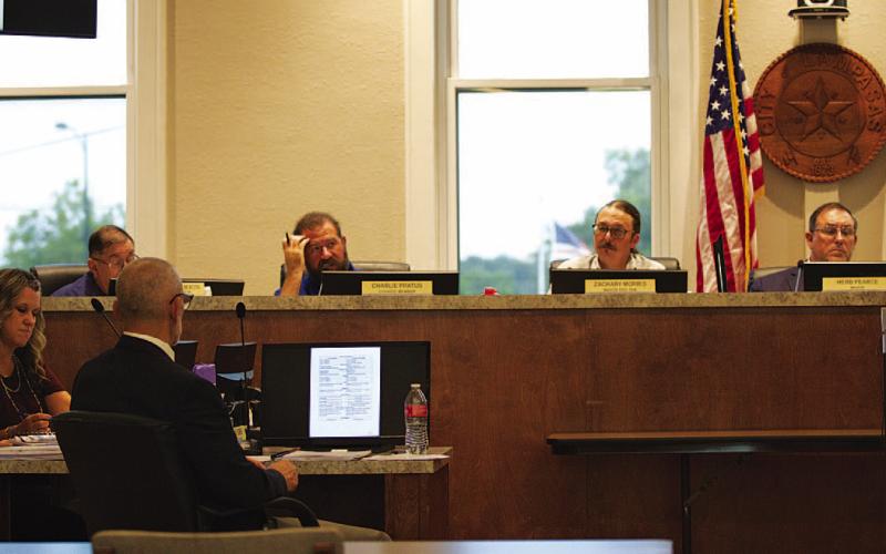City Manager Finley deGraffenreid looks on as members of the Lampasas City Council discuss business at their meeting Monday evening. HUNTER KING | DISPATCH RECORD