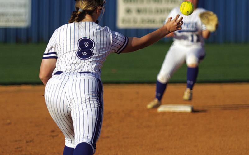 Kamryn Kothmann (8) throws to Julia Ybarra for an out at second base. HUNTER KING | DISPATCH RECORD