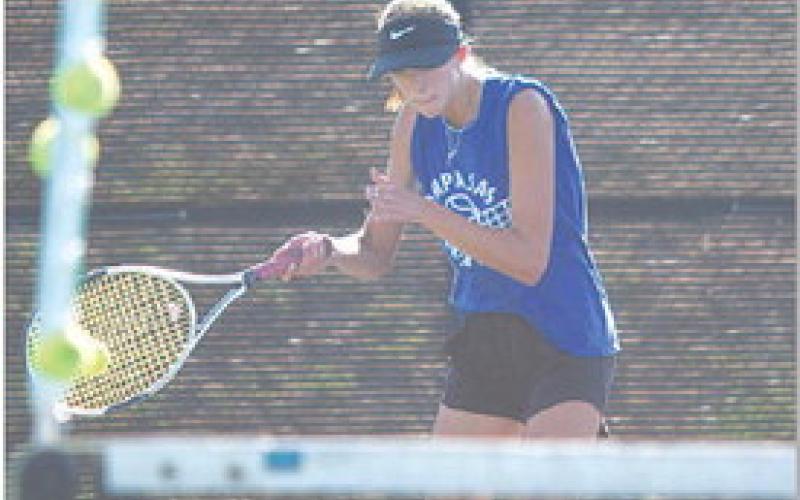 Chesley Breuer swings through a forehand shot. HUNTER KING | DISPATCH RECORD
