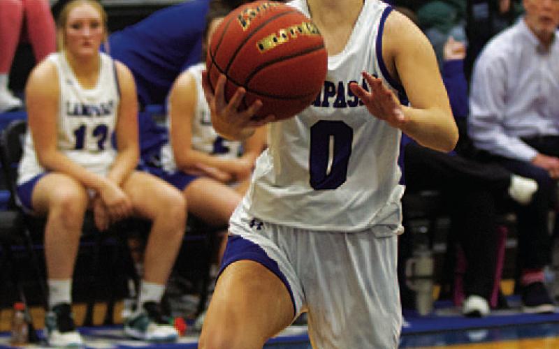 Addison Borchardt drives to the basket for a layup. HUNTER KING | DISPATCH RECORD