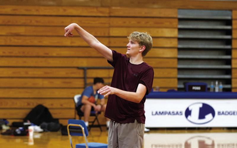 Nolan Lecker works on his free throws during the boys’ basketball camp. HUNTER KING | DISPATCH RECORD