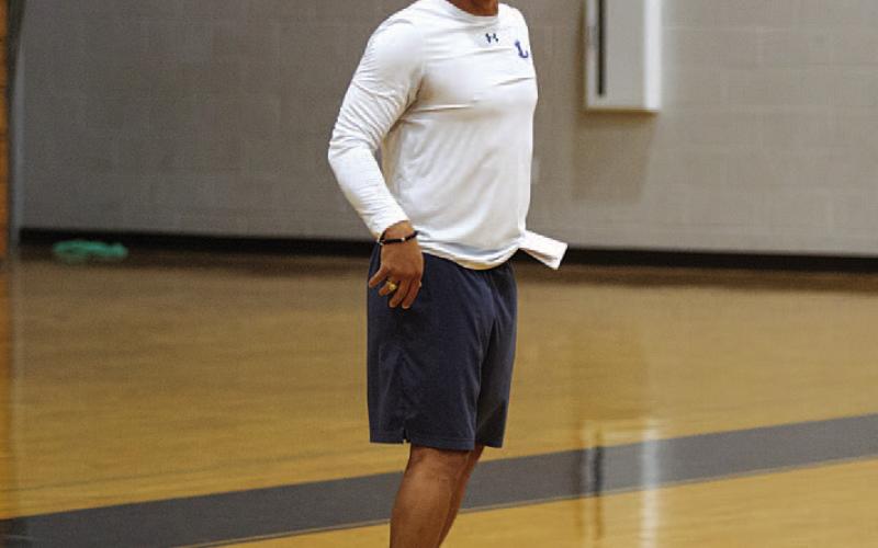 Marcus Chapa instructs the girls for the first day of camp. HUNTER KING | DISPATCH RECORD