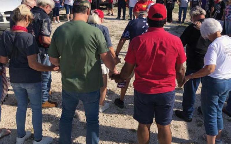 Before taking off from Lampasas to head toward Copperas Cove, Trump Train participants joined in a moment of prayer together. Courtesy photo