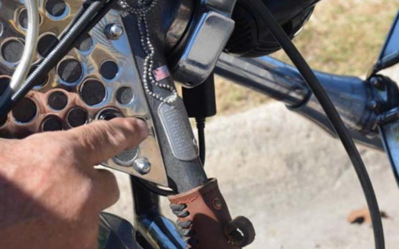 Every part of Wear’s custom ride has sentimental value, including his father’s dog tags. MONIQUE BRAND | DISPATCH RECORD