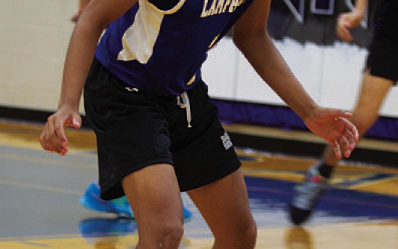 HUNTER KING | DISPATCH RECORD Angel Scott defends against Hamilton.
