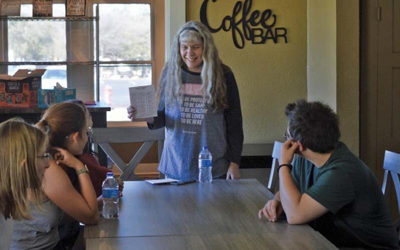 Lampasas High School special needs teacher and Wings of Eagles volunteer Becky Veroneau leads a teen dating violence workshop. erick mitchell | dispatch record