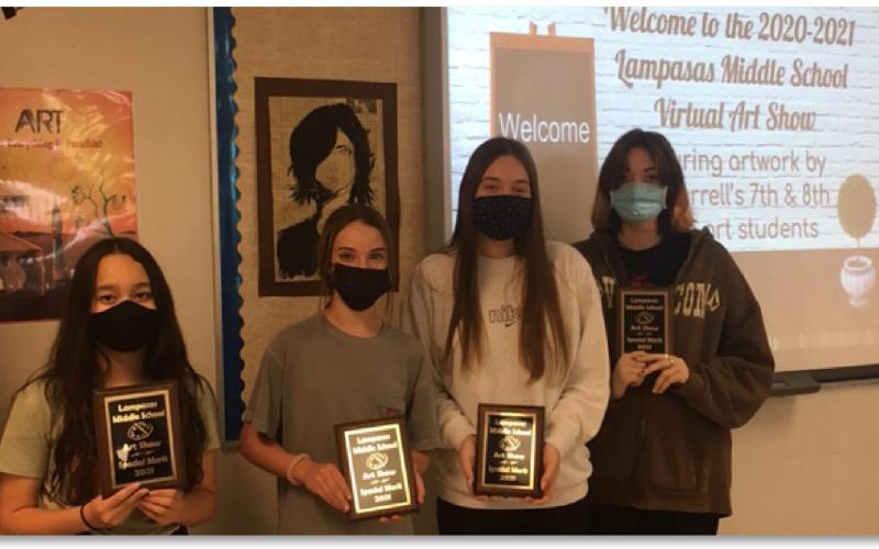 Shown with their plaques are the overall grade-level winners of the Lampasas Middle School Art Show. They are, from left, seventhgraders Sumiko Lemari and Aubrey Stubbs, and eighth-graders Cheyenne Hannibal and Lillie Jones. COURTESY PHOTO