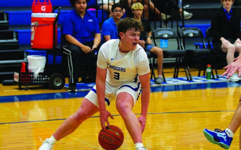 HUNTER KING | DISPATCH RECORD Aidan Nuckles dribbles during the most recent home game.