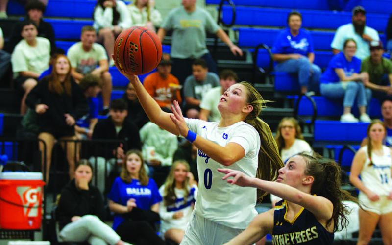 Addison Borchardt goes to the basket against Stephenville. The senior finished with 16 points in the home opener. HUNTER KING | DISPATCH RECORD