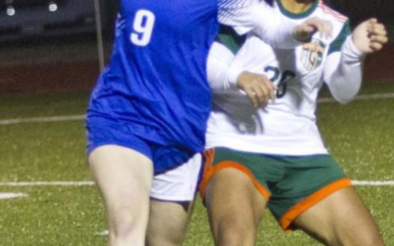 Bella Lindsey, left, was named co-Newcomer of the Year in alldistrict soccer. FILE PHOTO