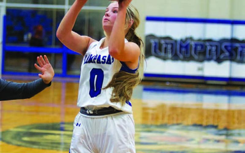 HUNTER KING | DISPATCH RECORD Addison Borchardt shoots a floater over a defender.