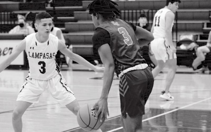 Jacob Hogeda, left, defends against Georgetown East View in the Badgers’ last home game before Thanksgiving. Thursday after press time, the Badgers were scheduled to play at Thorndale.