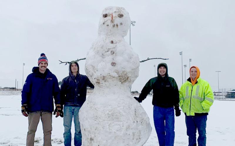 .Jared Payne, Shane Wolfe, Callan Wolfe and James Sommerville built this snowman, estimated to be 10 feet tall, at the sports park on FM 580 West.