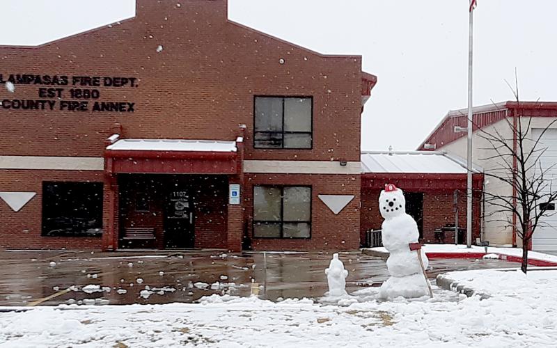 A snowman is shown in front of the Lampasas Fire Department station after firefighters returned from a structure fire on FM 2808 on Sunday. (Photo by Jeff Lowe)