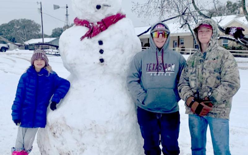 Kim Langford submitted this photo of a snowman who stood 7 feet, 4 inches tall.