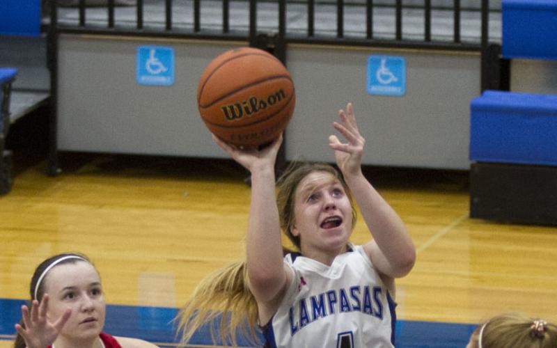 Aspen Wheeler shoots from the paint near the end of Tuesday's game in Lampasas.