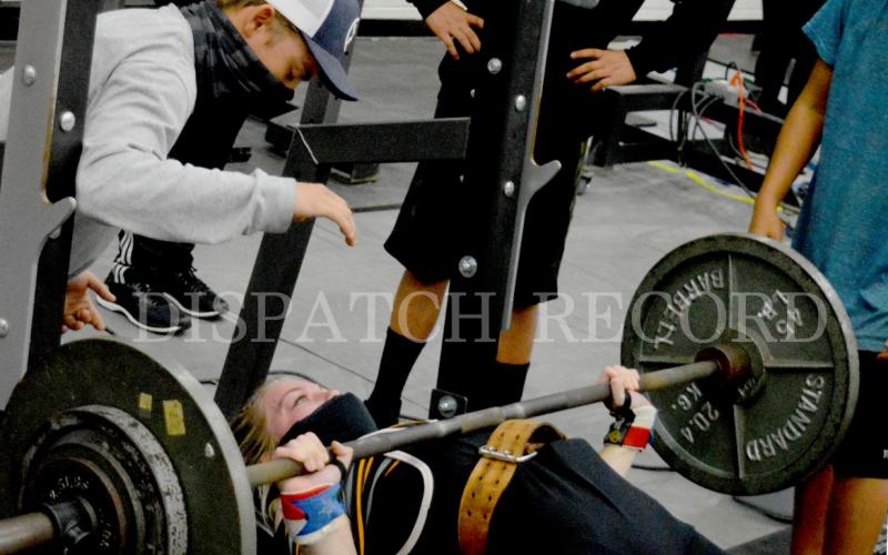 Alyssa Ayers bench presses 200 pounds while her brother, former Badger state qualifier Jason Ayers, spots.