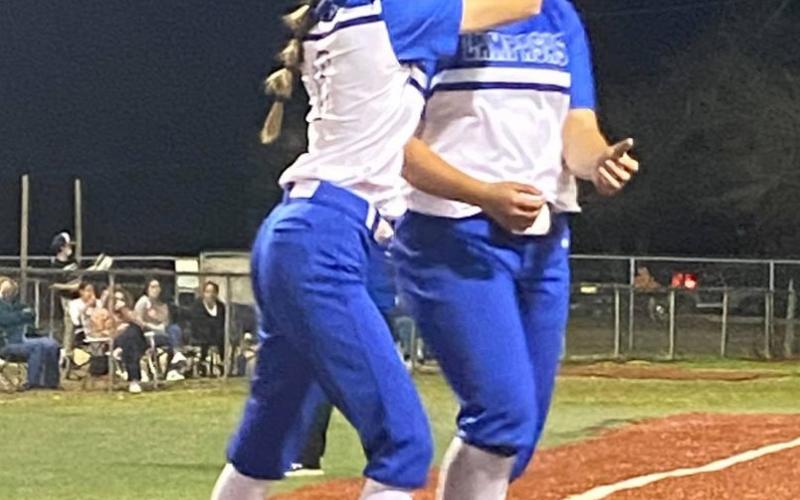 Kayli Syx, left, celebrates with Alycia Cantu after Cantu's two-run home run. (Courtesy photo)