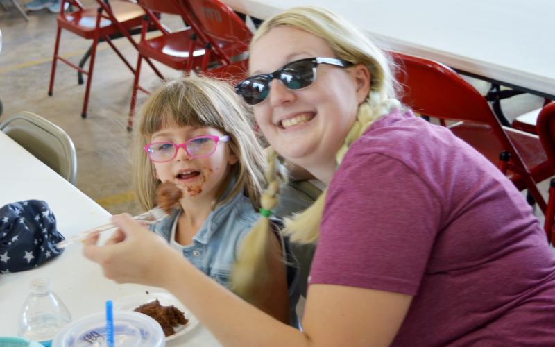 Kempner residents Malyssa Allen and her daughter Fionna enjoy dessert at the KVFD fundraiser.