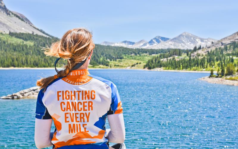 Rider overlooks Sierra Nevada Mountain Range in Cailfornia.