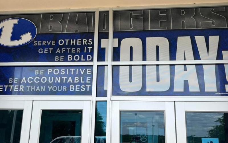 Doors at the entrance of Lampasas High School feature a new design to encourage positive character qualities