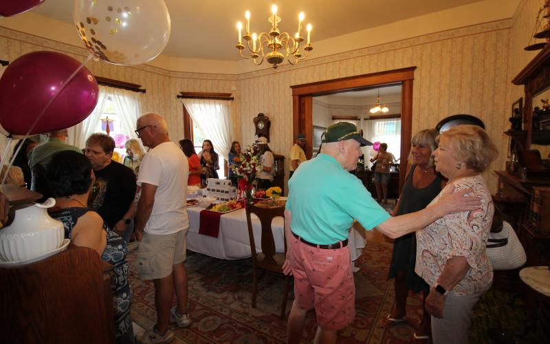 JOYCESARAH MCCABE | DISPATCH RECORD Turnout for the Gillen House ribbon-cutting event was robust. Pictured here is the dining room of the house, which now will serve as a short-term rental property.