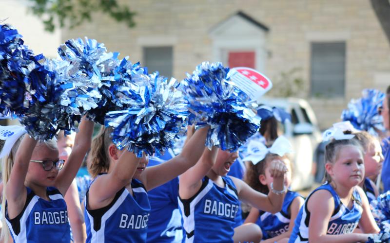 JOYCESARAH MCCABE | DISPATCH RECORD These young Badger cheerleaders are full of pep as they cheer during the Homecoming Parade.