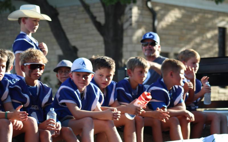 JOYCESARAH MCCABE | DISPATCH RECORD These young Badgers ride in this year's Homecoming Parade.