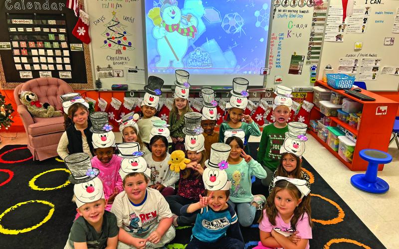 Miss Garza's class dons Frosty the Snowman hats for a holiday photo. COURTESY PHOTO